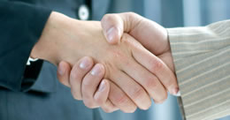 Photo of handshake.  Link to Membership page